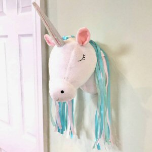Unicorn head wall dec from sash and belle